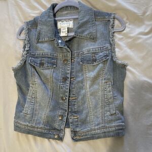 Distressed denim vest
